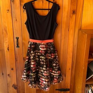 Db. Beautiful multi color skirt bottom with black upper top. Size Womens 18